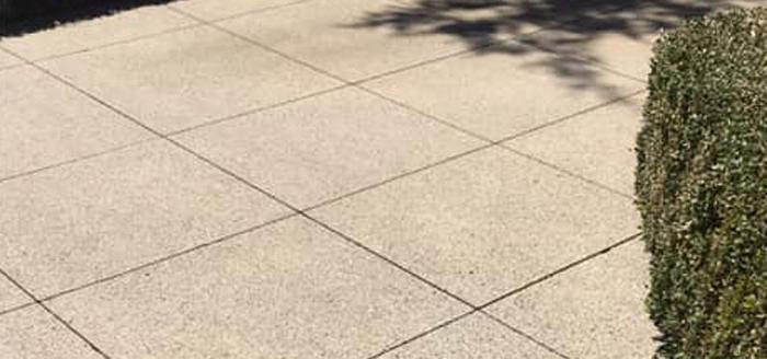 grand rapids concrete cleaning service removes dirt and stains from driveways and patios
